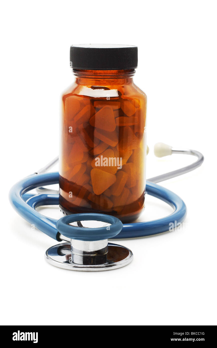 Stethoscope and bottle of vitatmins supplement- Healthare concept Stock Photo