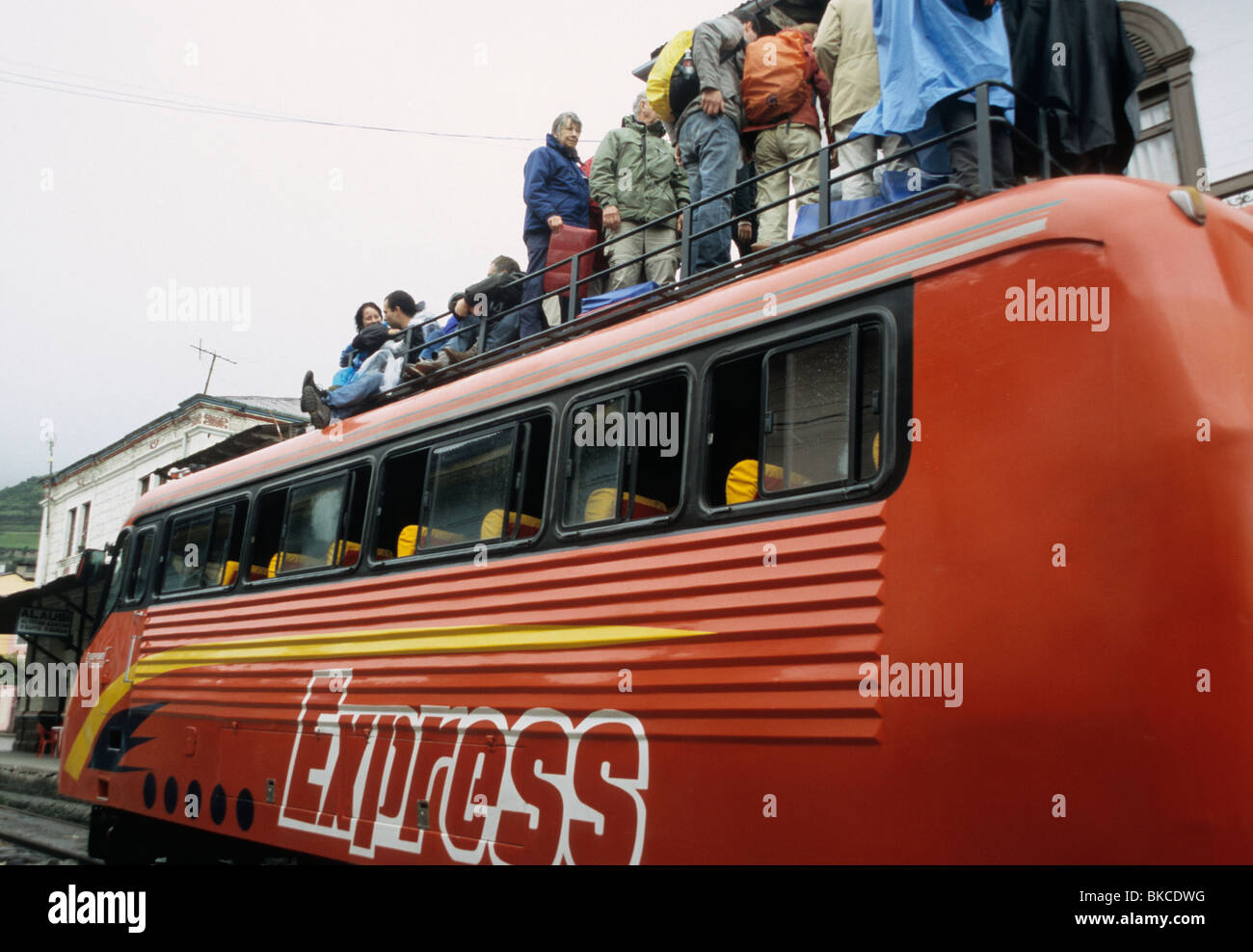 Passengers boarding a railbus in Alausi, Ecuador (Train to the devil's ...