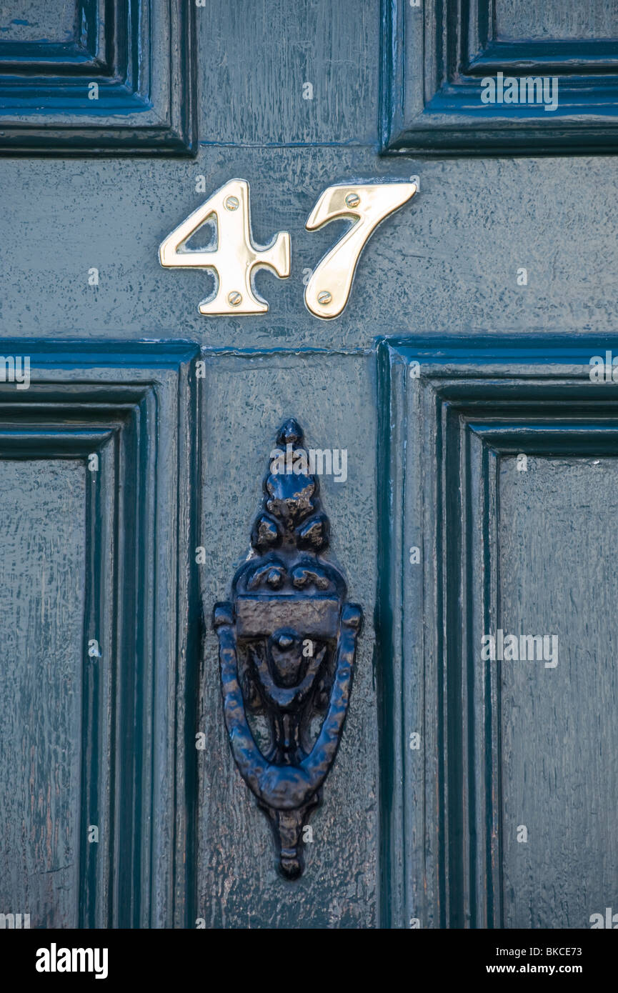 No 47 dark green front door of house with knocker Ludlow Shropshire England UK Stock Photo