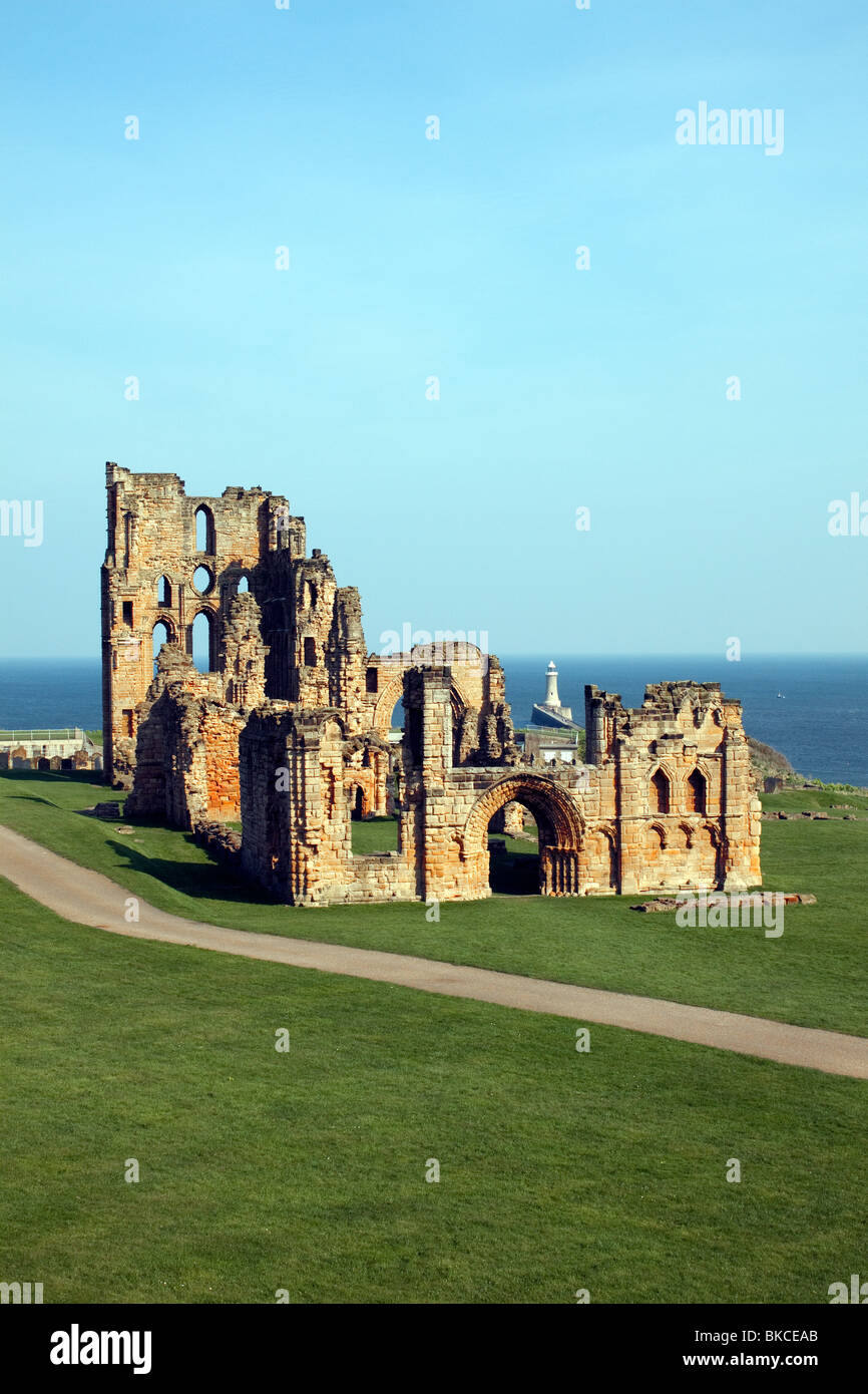 Tynemouth Priory castle with Tynemouth pier in the distance Stock Photo
