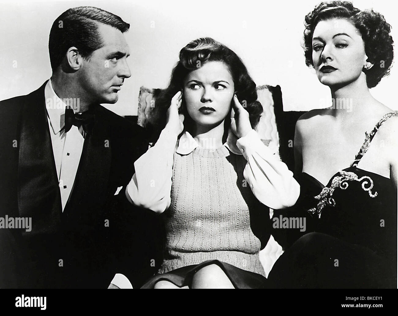 BACHELOR KNIGHT (1947) THE BACHELOR AND THE BOBBYSOXER (ALT) CARY GRANT, SHIRLEY TEMPLE, MYRNA LOY BACH 003P Stock Photo