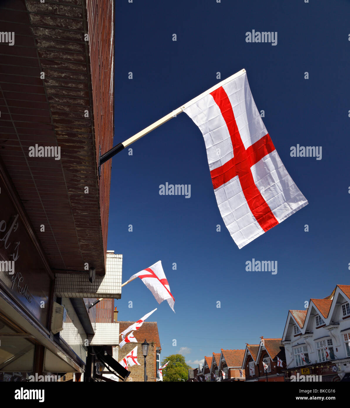 English flag of Saint George. Cobham High Street. Stock Photo