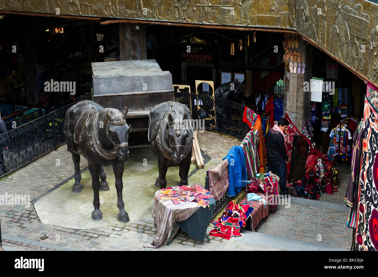 A view of the Horse Hospital Stables Market with a Horse statue part of Camden Market North London UK Stock Photo