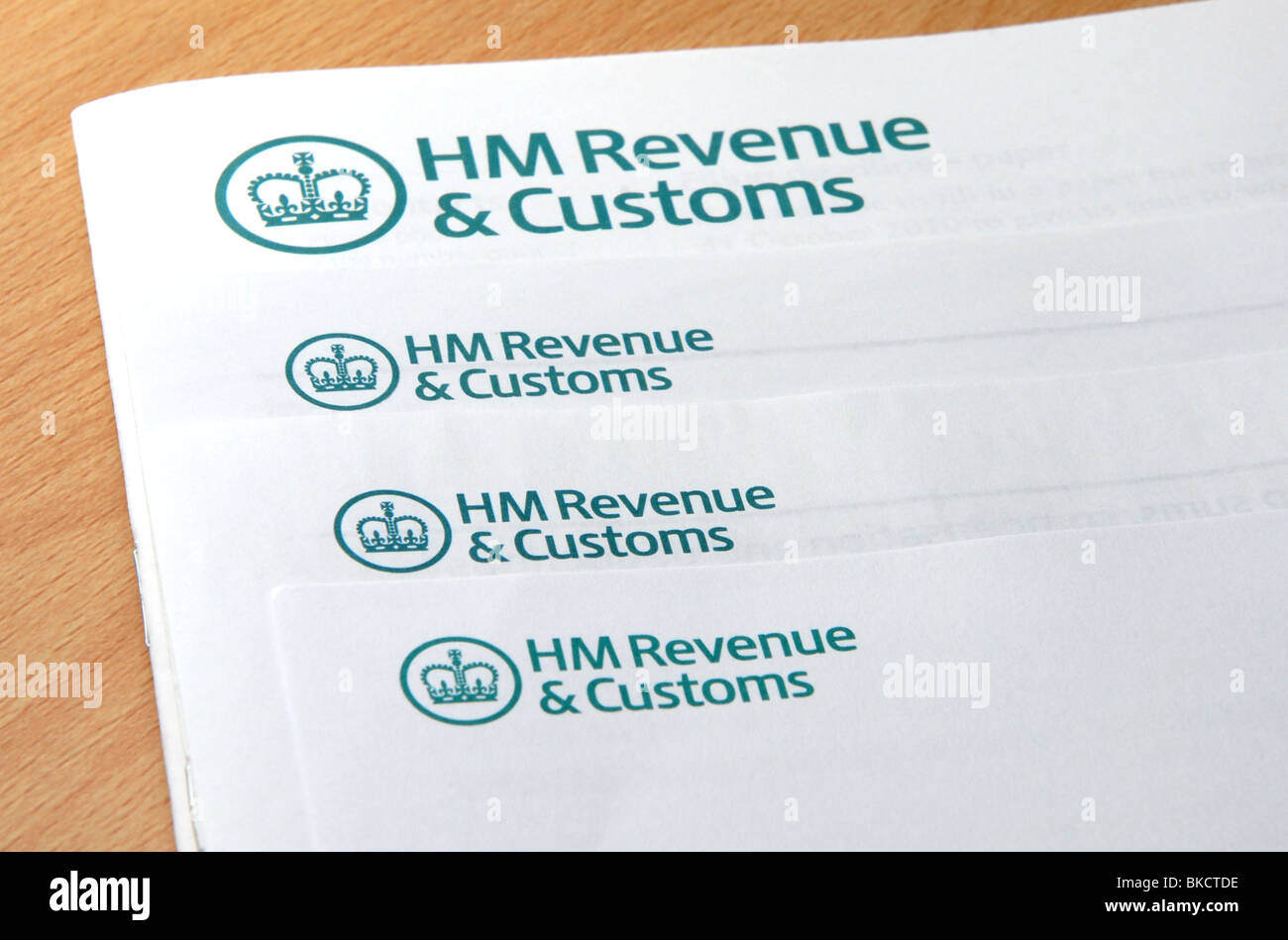 HM revenue and Customs Tax return and forms arrive once again.  Generic shot of HMRC logo on forms Stock Photo