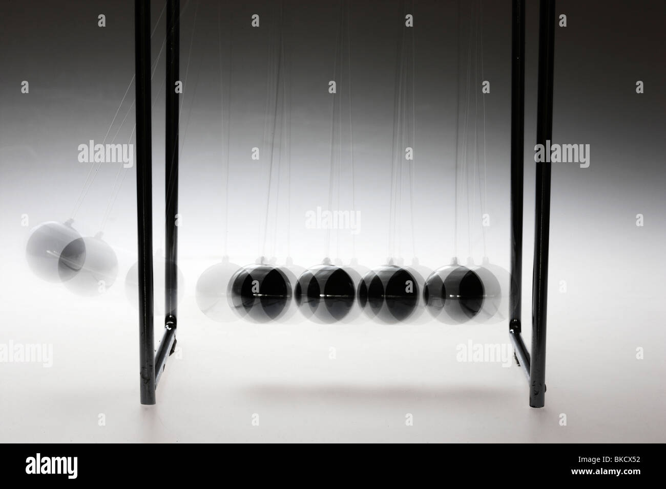 Pendulum, chrome balls, toy, gives impulses. Newton pendulum Stock