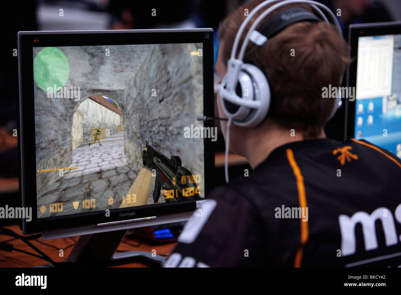 Boy is playing a killer video game on the computer Stock Photo Alamy