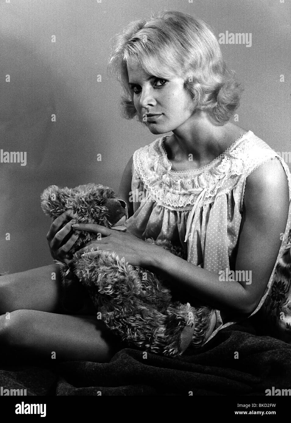 fashion, 1960s, ladies' fashion, nightshirt, woman wearing baby doll holding teddy bear, , Stock Photo