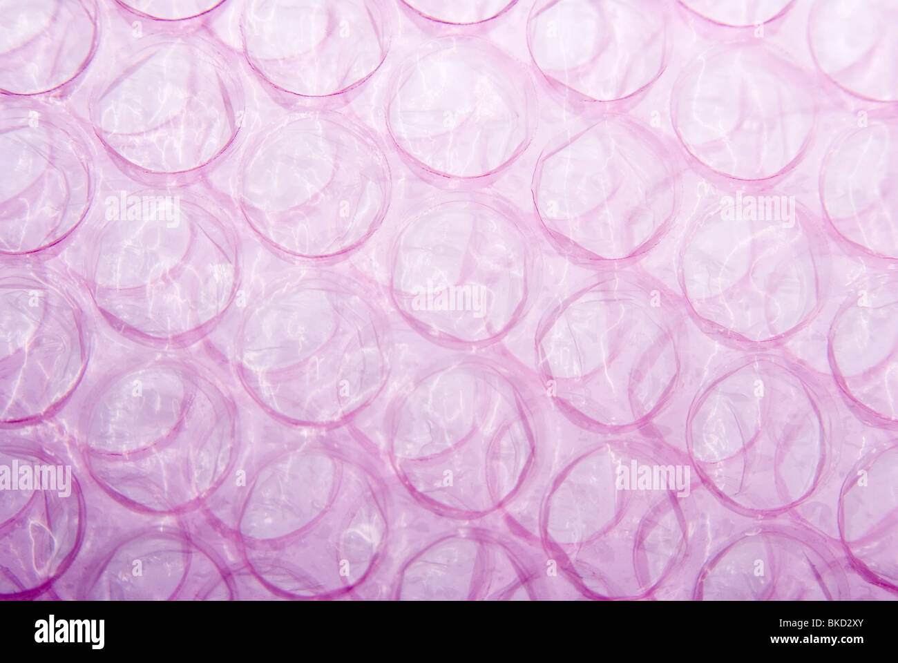 Premium Photo  Pink plastic wrap air bubble texture background