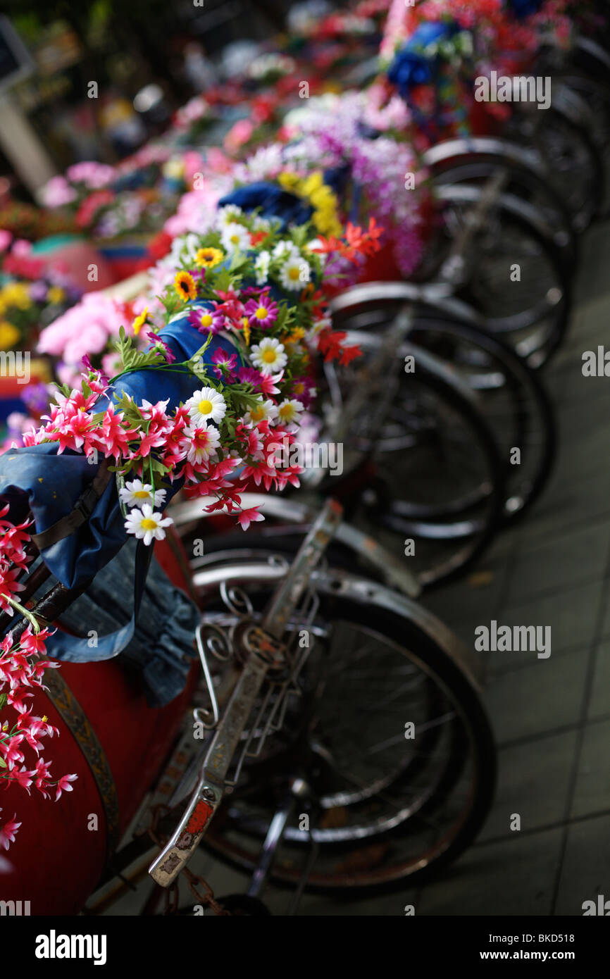 Bicycles decorated with flowers in Bangkok, Thailand Stock Photo