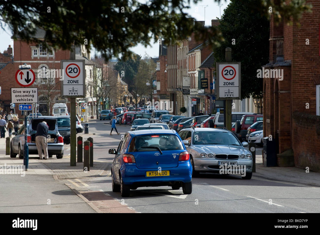Traffic entering a 20 mph zone in the small market town of Market Harborough, Leicestershire, England. Stock Photo