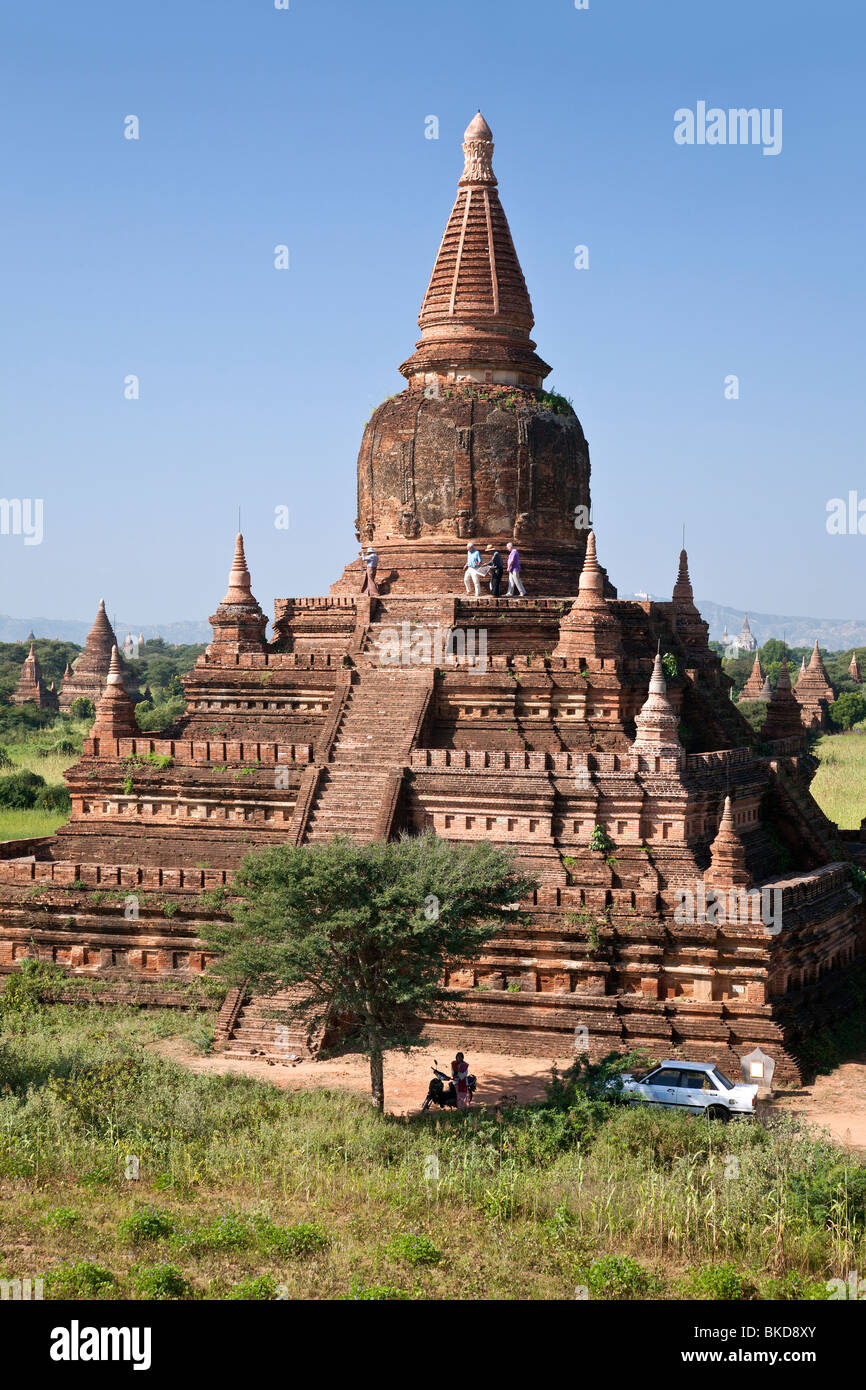 Tourists visiting Buledi temple. Bagan. Myanmar Stock Photo