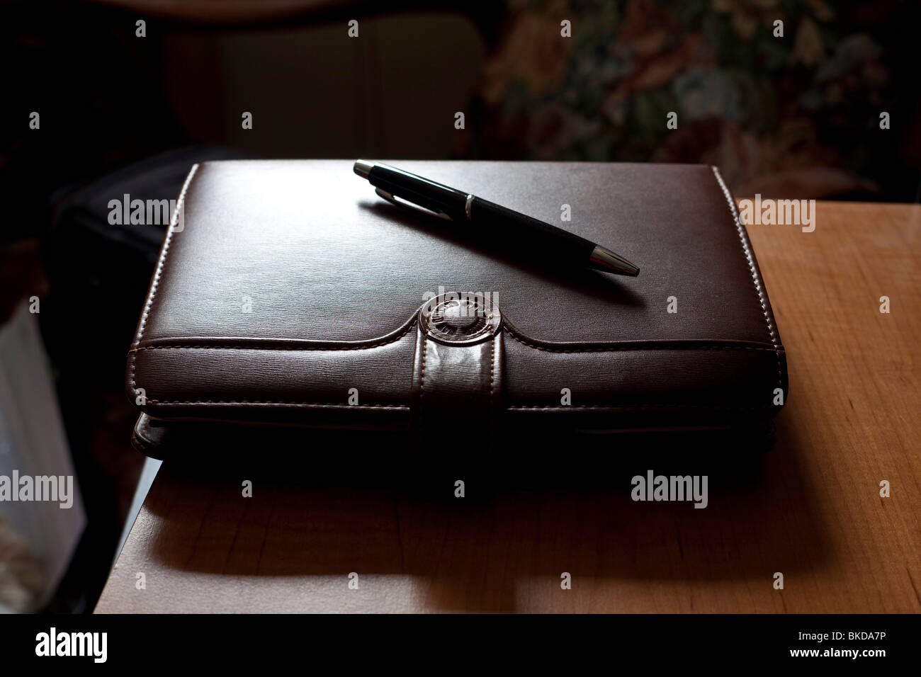 A diary address book day planner leather bound with a snap closure