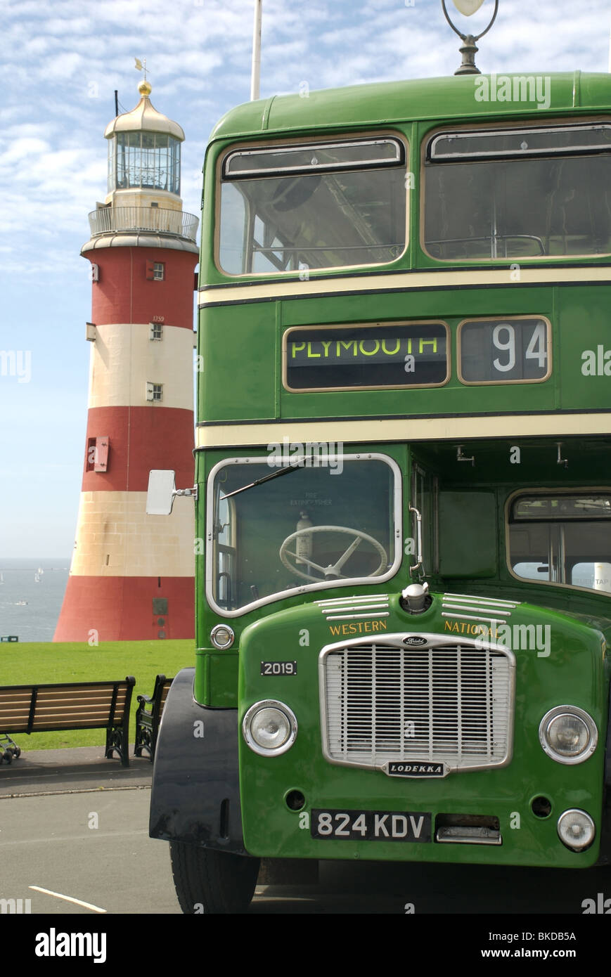 A Western National Bristol Lodekka bus and Smeaton's Tower, The Hoe, Plymouth, Devon, UK Stock Photo