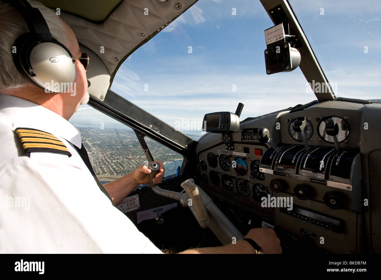 Pilot Flying Above Victoria Harbour Vancouver Island BC Canada Stock Photo