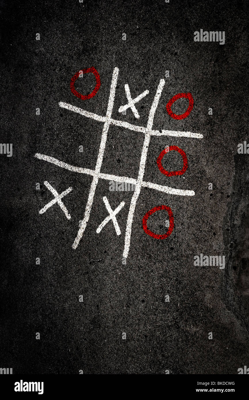Noughts and Crosses game on paving Stock Photo Alamy