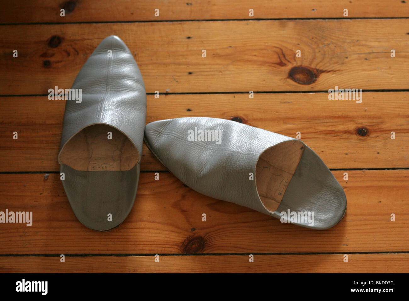 Slippers On A Wooden Floor Stock Photo Alamy slippers-on-a-wooden-floor-stock-photo-alamy