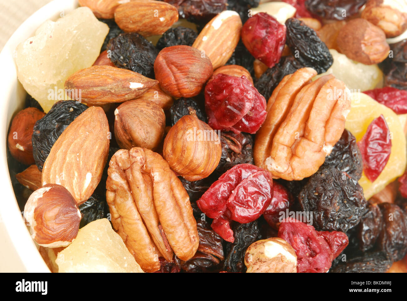 Fruit and nuts. Pecan nuts, hazelnuts, almonds, dried cranberries
