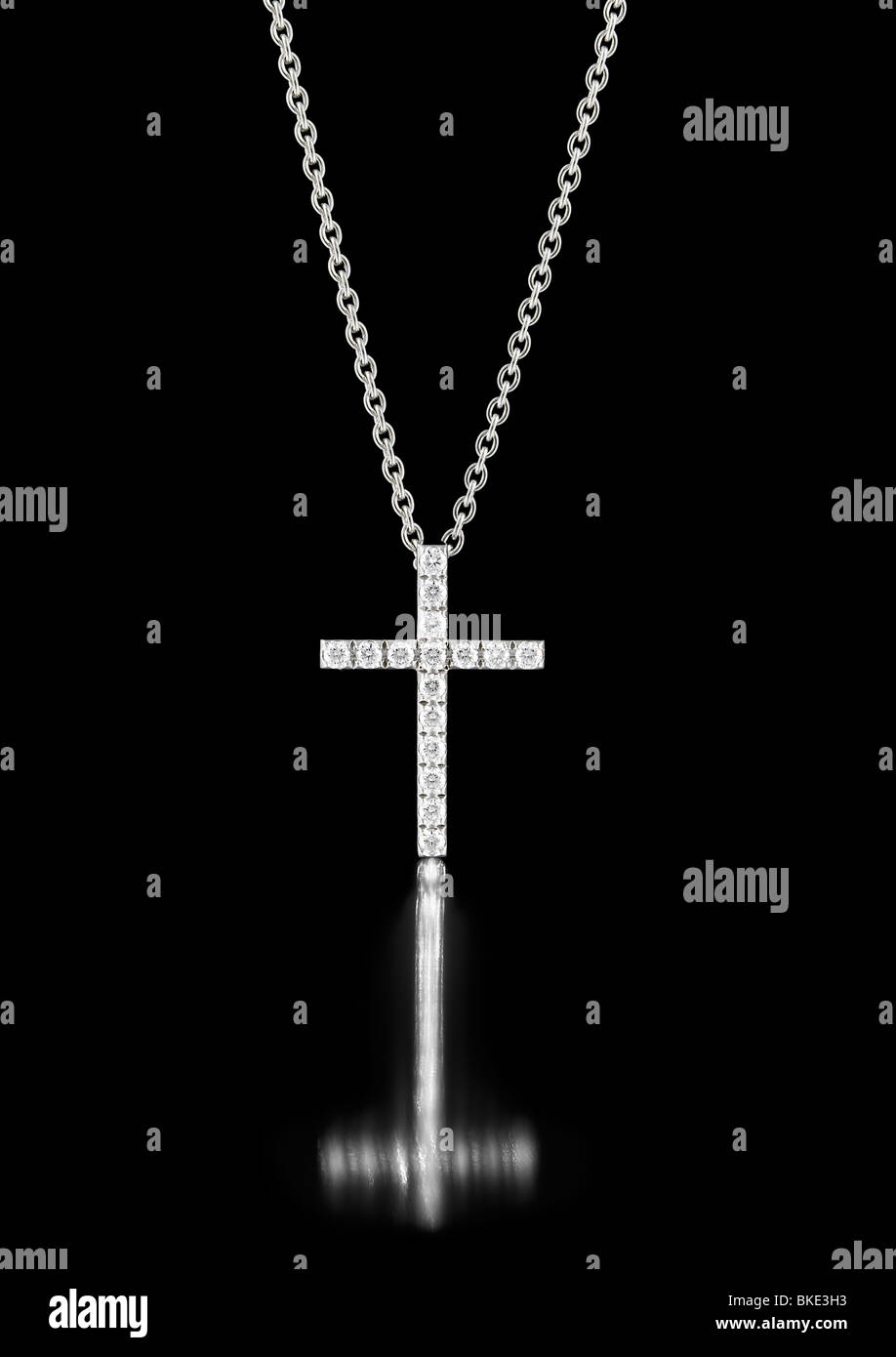 White diamond studded cross necklace Stock Photo