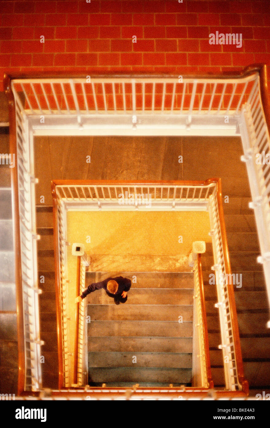 Man in Stairwell, Ellis Island Stock Photo