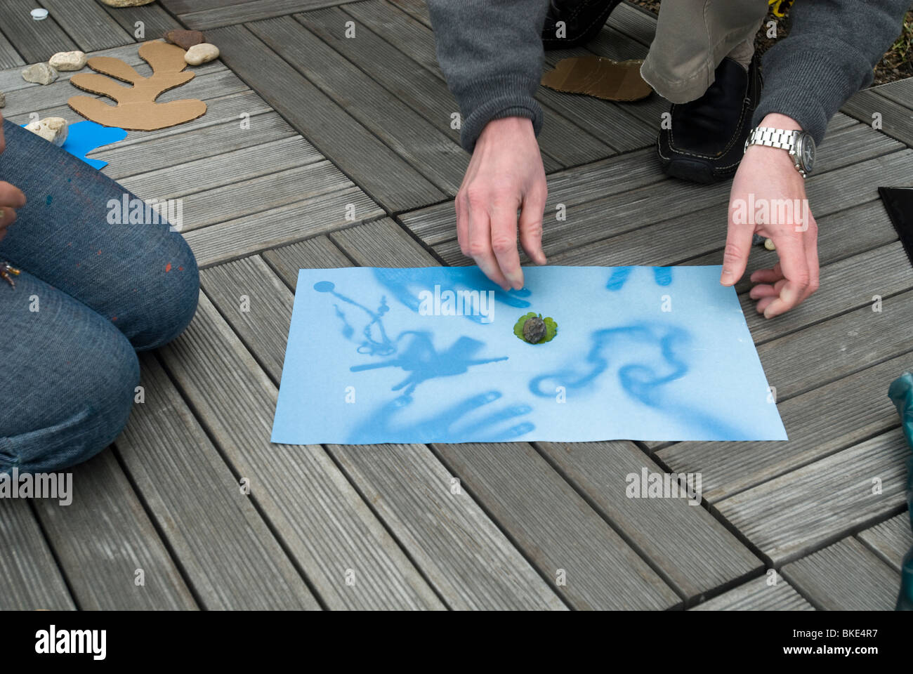 Photo enthusiasts create solar prints or cyanotypes in New York Stock Photo