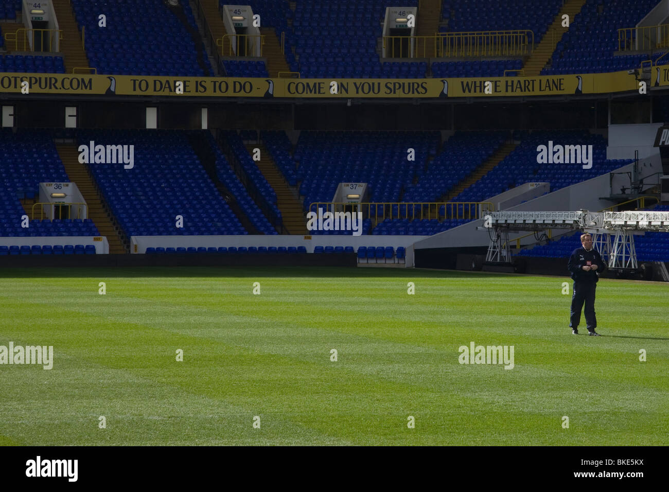 Tottenham hotspurs football stadium with manager Harry Redknapp on the Football pitch Stock Photo