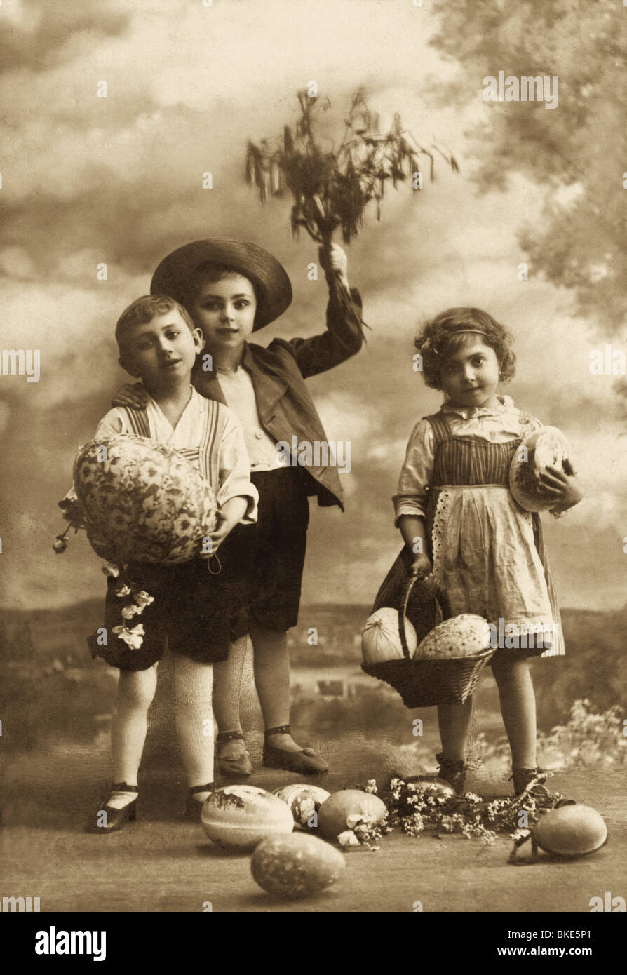 Easter, three children with Easter eggs, picture postcard, 1924, Stock Photo