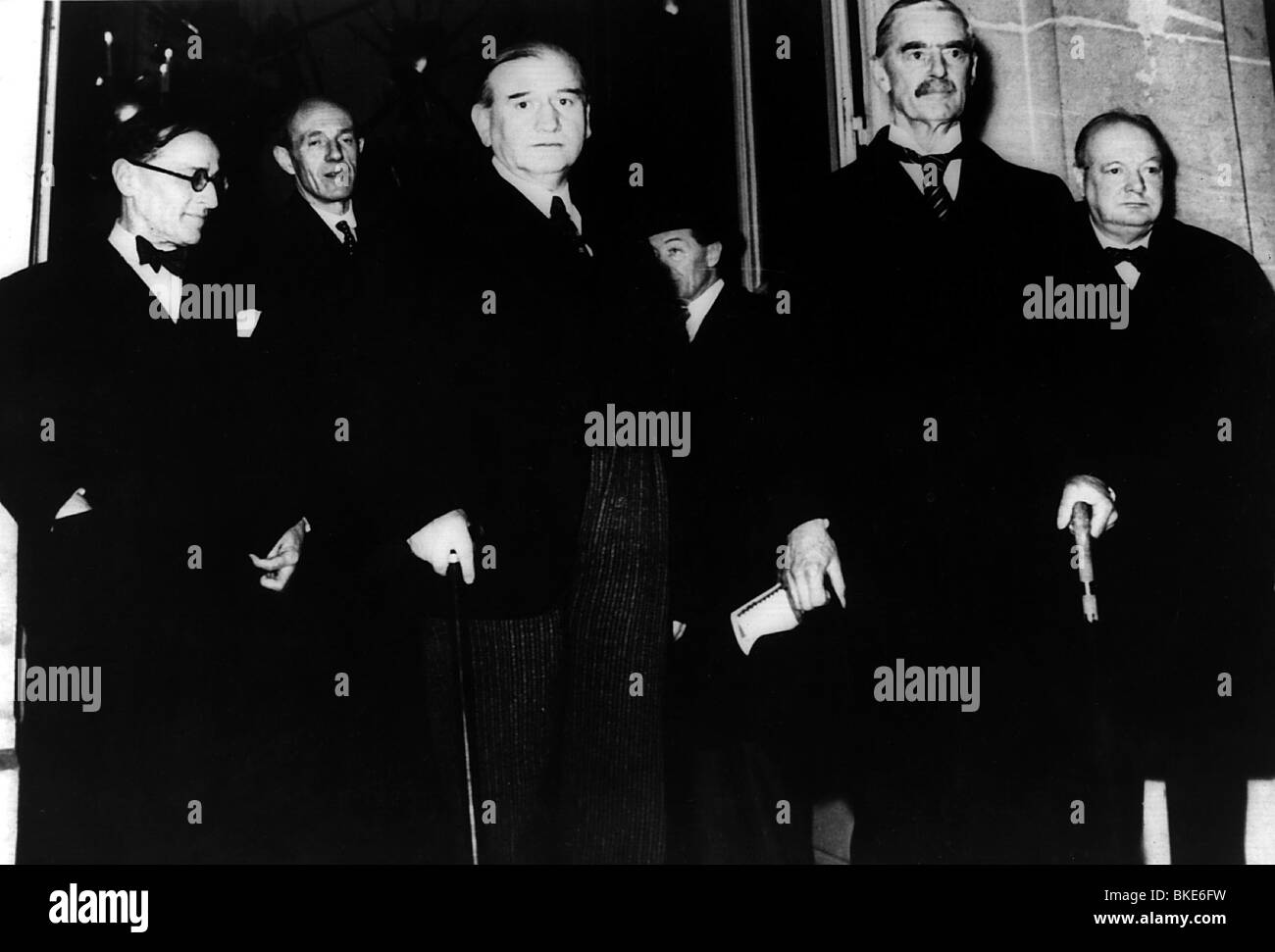 Chamberlain, Arthur Neville, 18.3.1869 - 9.11.1940, British politician, full length, during a meeting of the Allied Supreme War Council, February 1940, with Lord Halifax, Winston Churchill and Edouard Daladier, Stock Photo