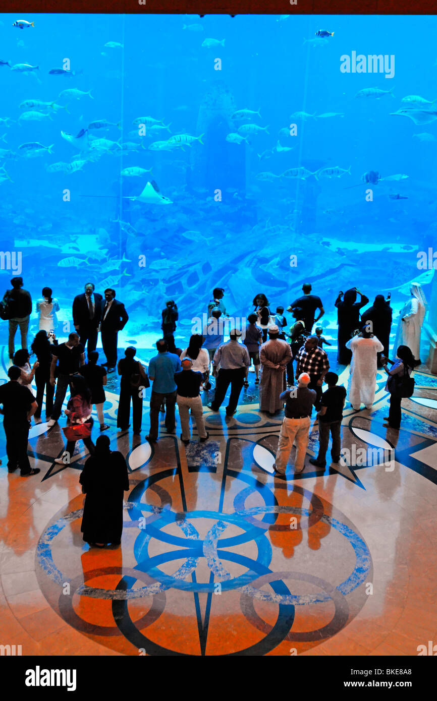 Atlantis Hotel, The Palm Jumeirah, Visitors watching the Aquarium, Manta stingray, whale, Stock Photo