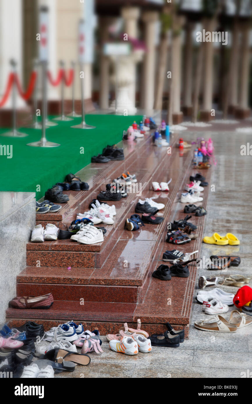 Shoes in front of Jumeirah mosque in Dubai Stock Photo
