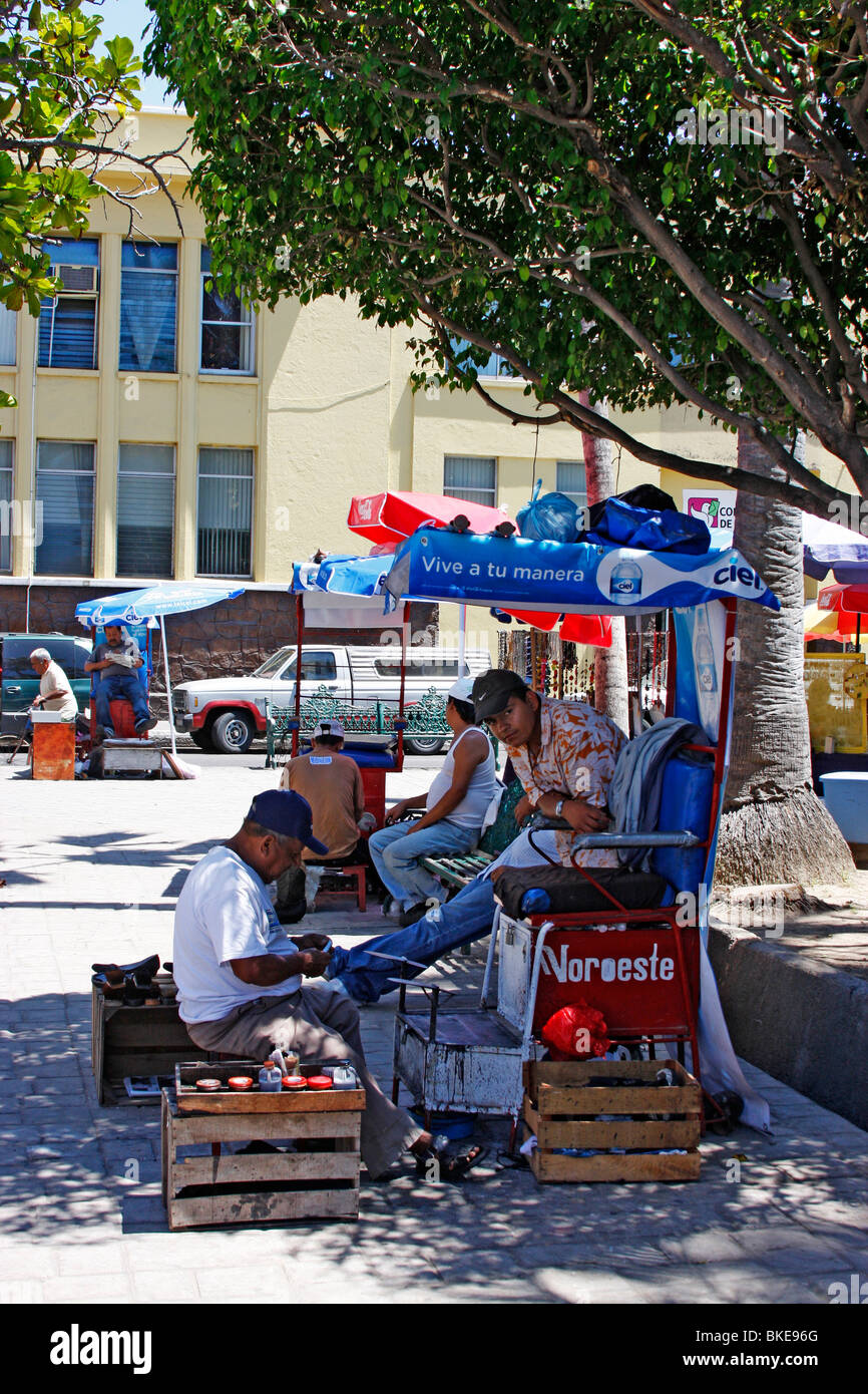 Shoe shine in the town  square at Mazatlan,Sinaloa,Mexico. Stock Photo