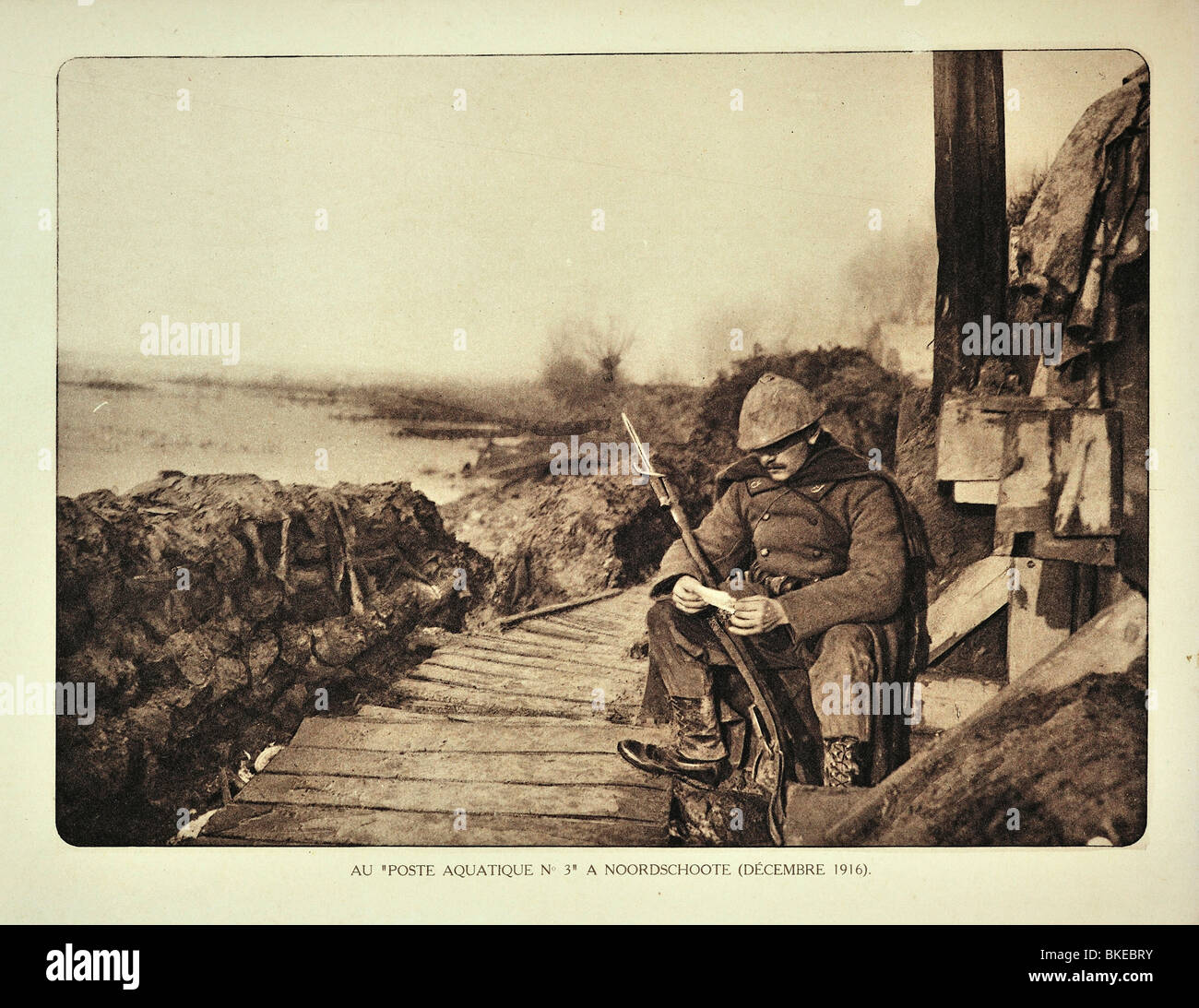 WW1 sentry with fixed bayonet on rifle at Noordschote in West Flanders in winter during the First World War One, Belgium Stock Photo