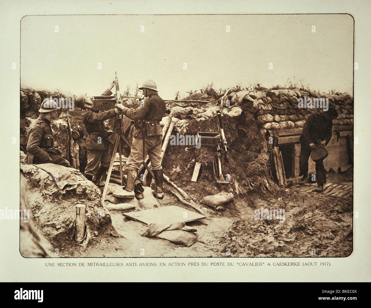 Belgian WWI soldiers in trench armed with anti-aircraft guns at Kaaskerke, West Flanders during the First World War One, Belgium Stock Photo