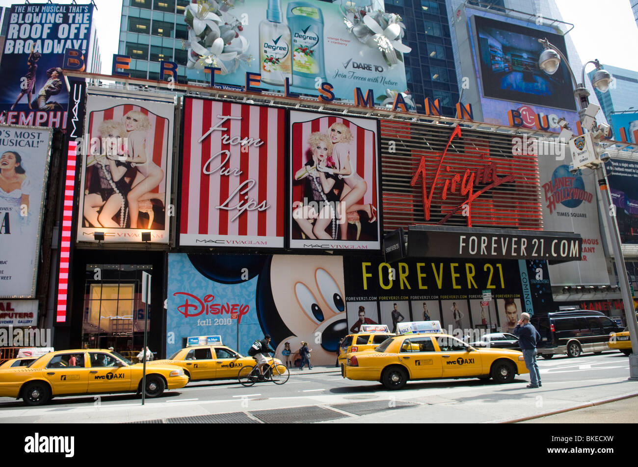 Signage announces the arrival of the Mac cosmetics store in Times Square in New York Stock Photo - Alamy