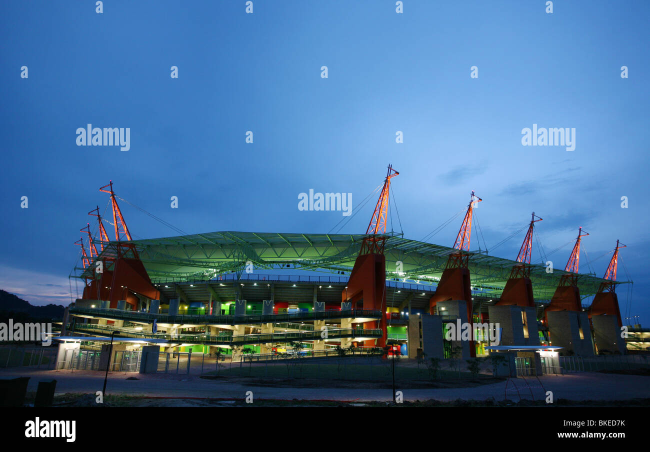 Mbombela stadium at night showing the giraffe-like structures holding up the roof Stock Photo