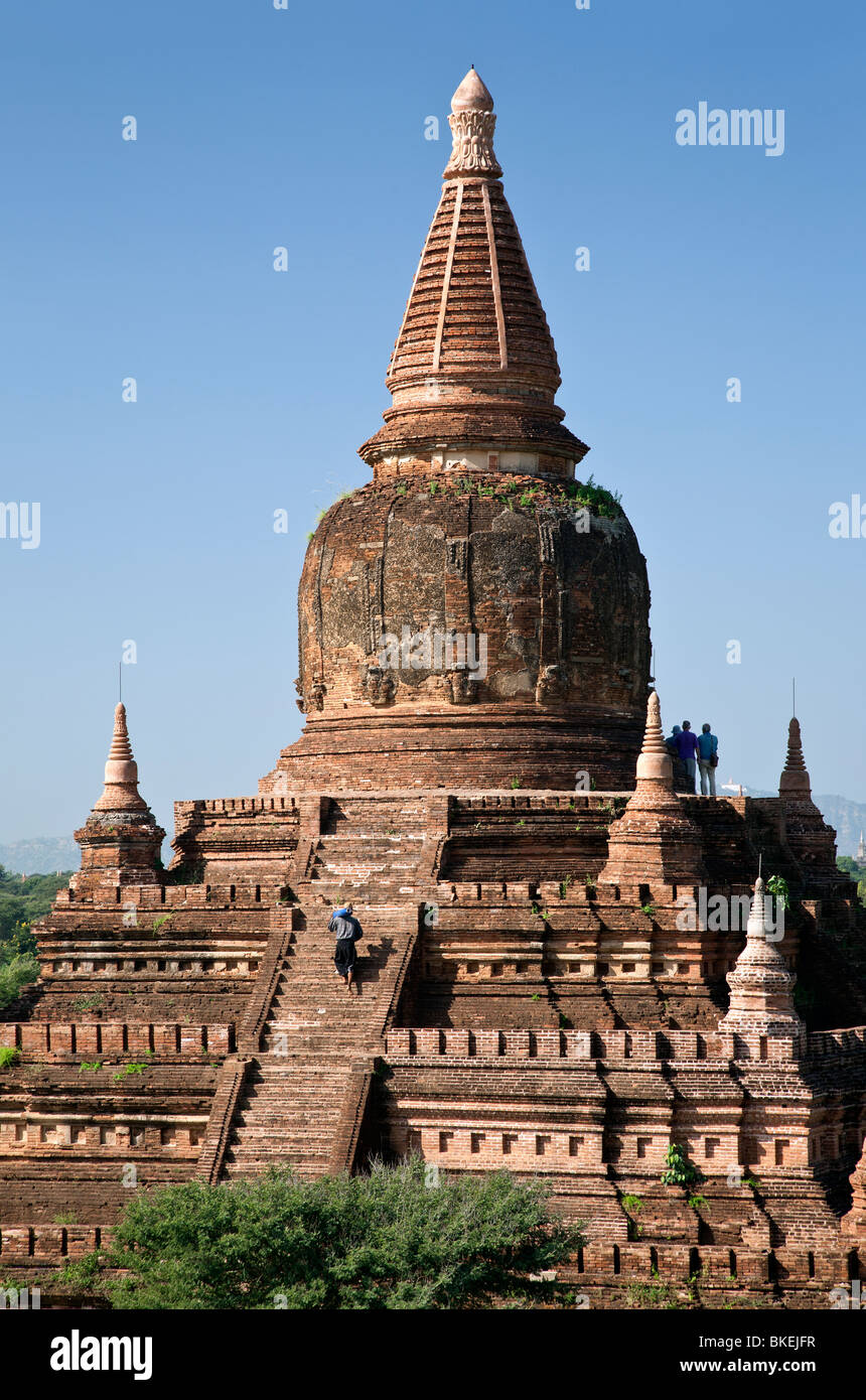 Tourists visiting Buledi temple. Bagan. Myanmar Stock Photo