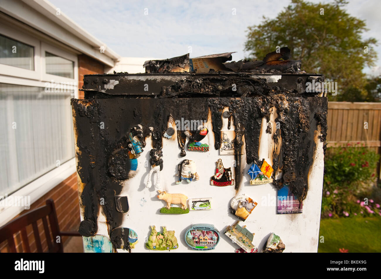 Domestic fridge freezer melted and burnt following fire caused by