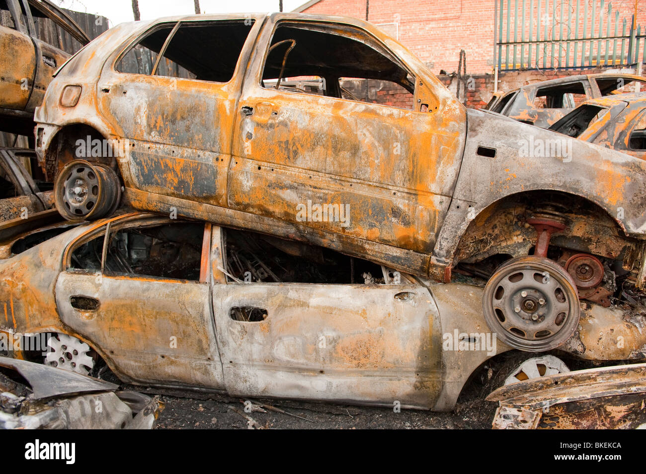 Burnt out cars following fire at scrapyard Stock Photo - Alamy