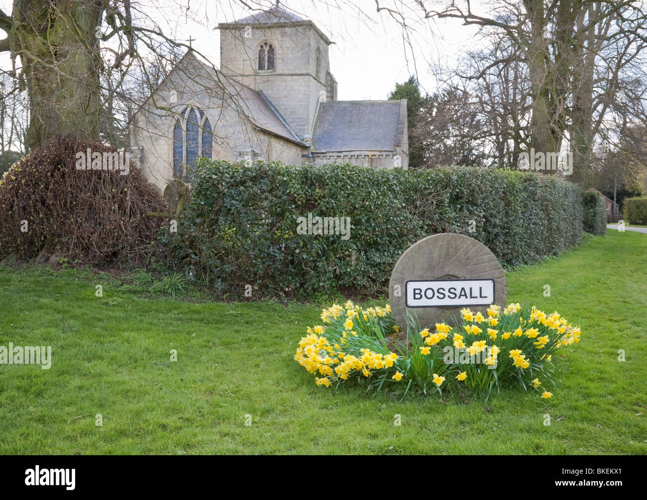 Bossall village sign with church of St. Botolph. Stock Photo