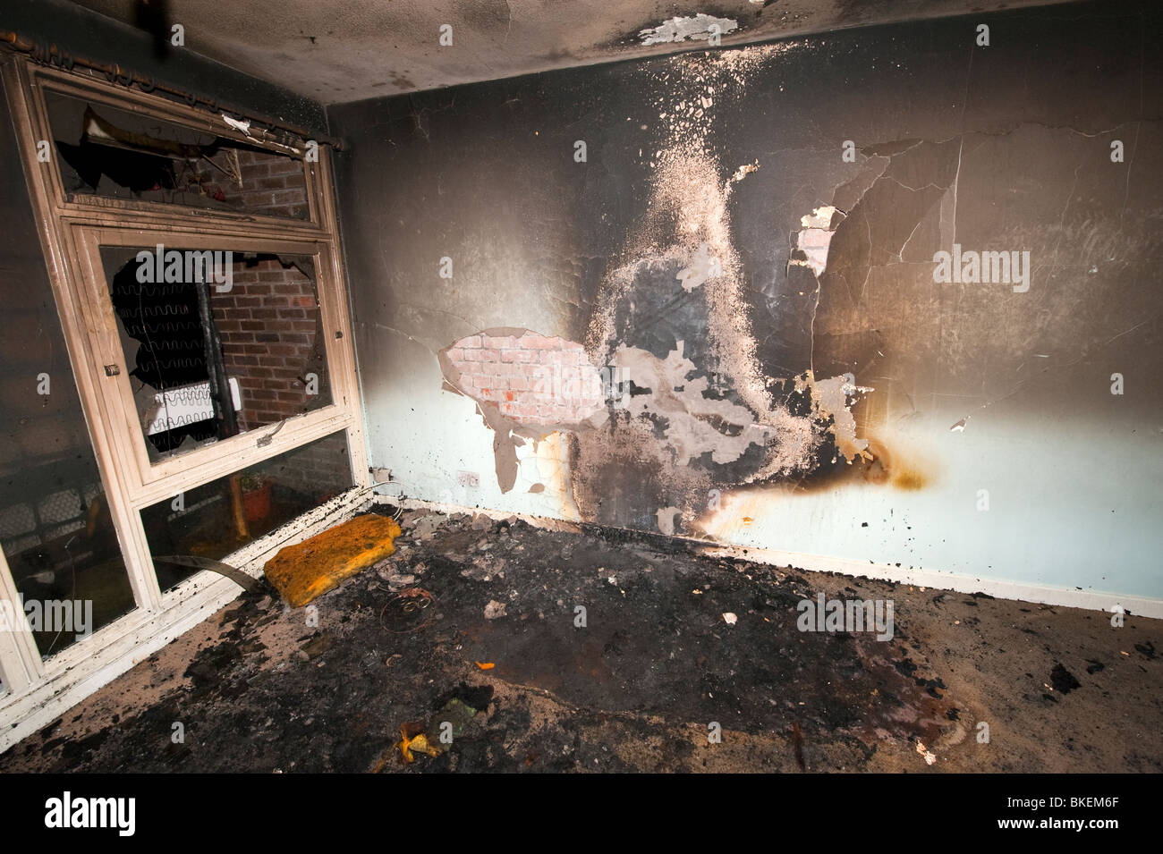 Burn pattern on wall from domestic sofa fire Stock Photo - Alamy