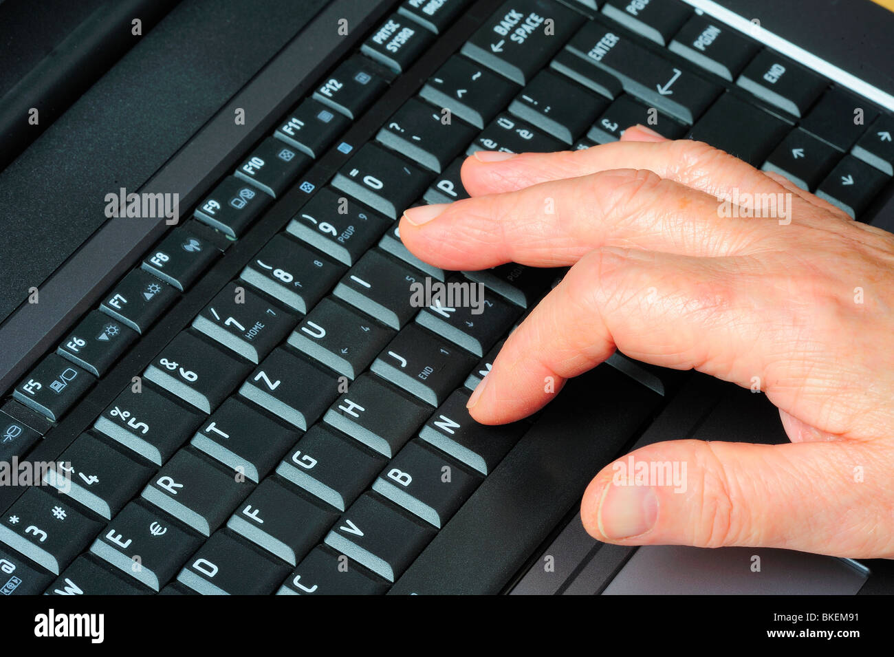 Close up view of a person using a French computer keyboard (QWERTZ) with  accented letters and other differences from the English Stock Photo - Alamy