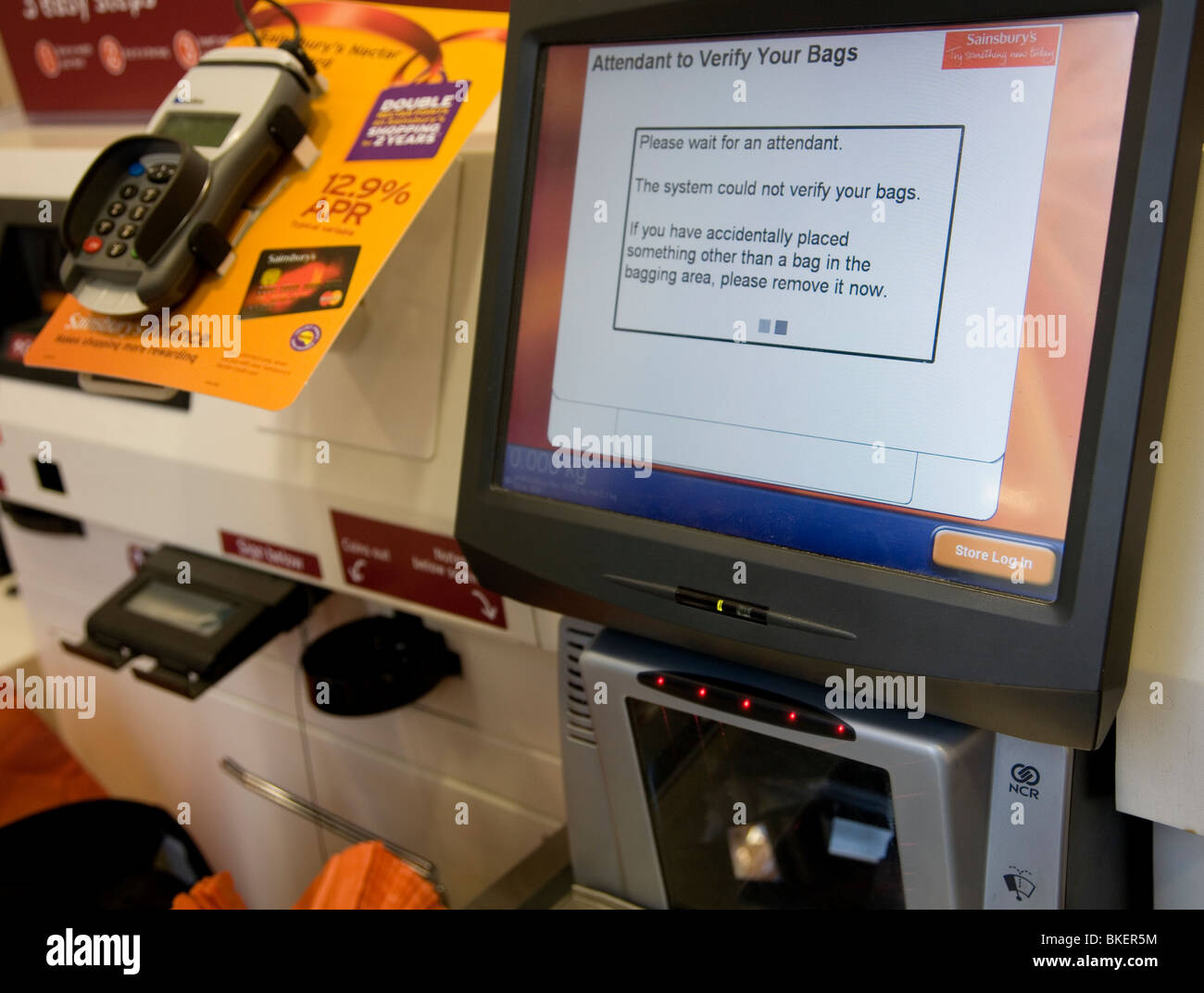 Sainsbury's check out terminal Stock Photo Alamy