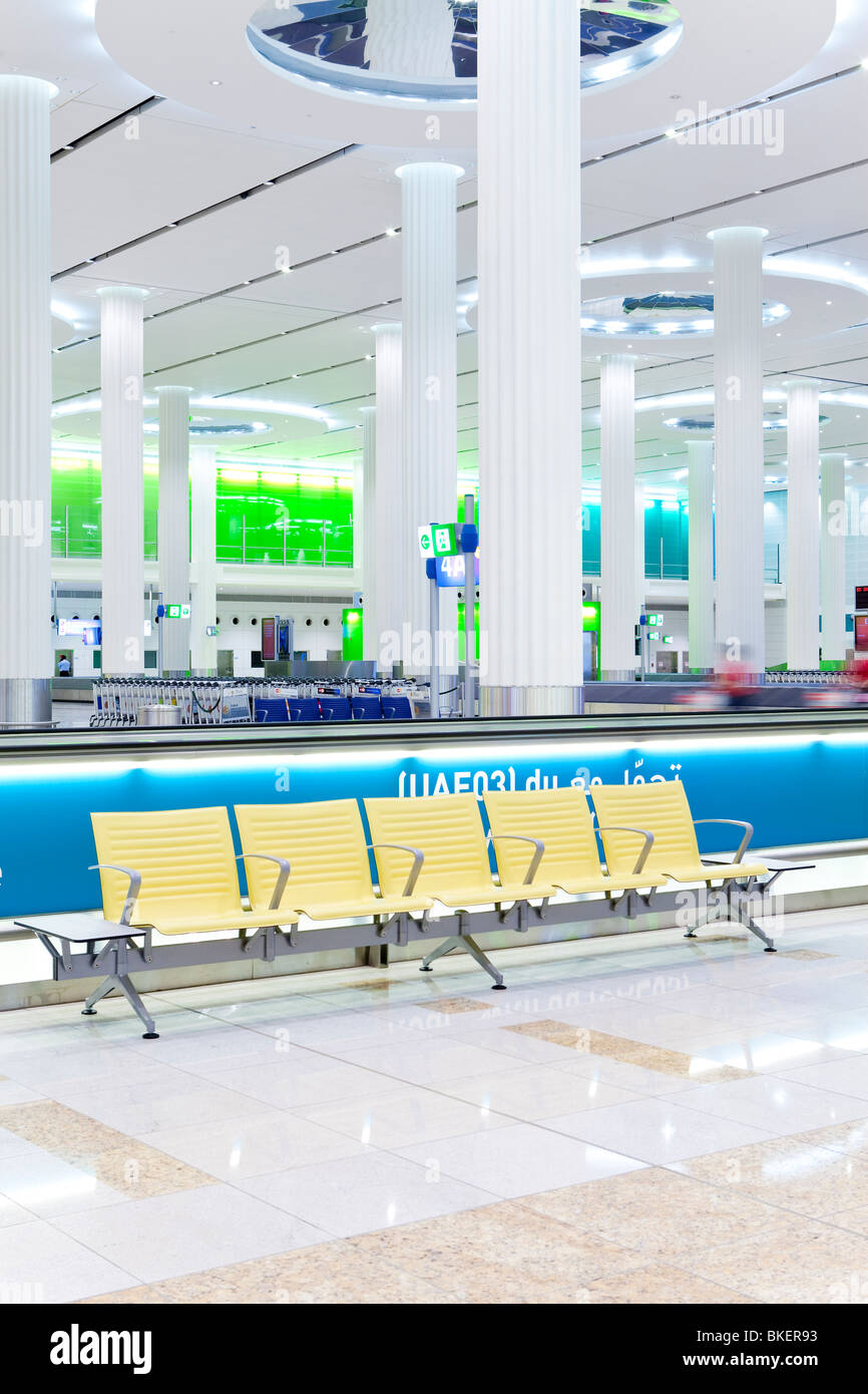 UAE, United Arab Emirates, Dubai, Dubai International Airport, Terminal 3, Row of chairs Stock Photo