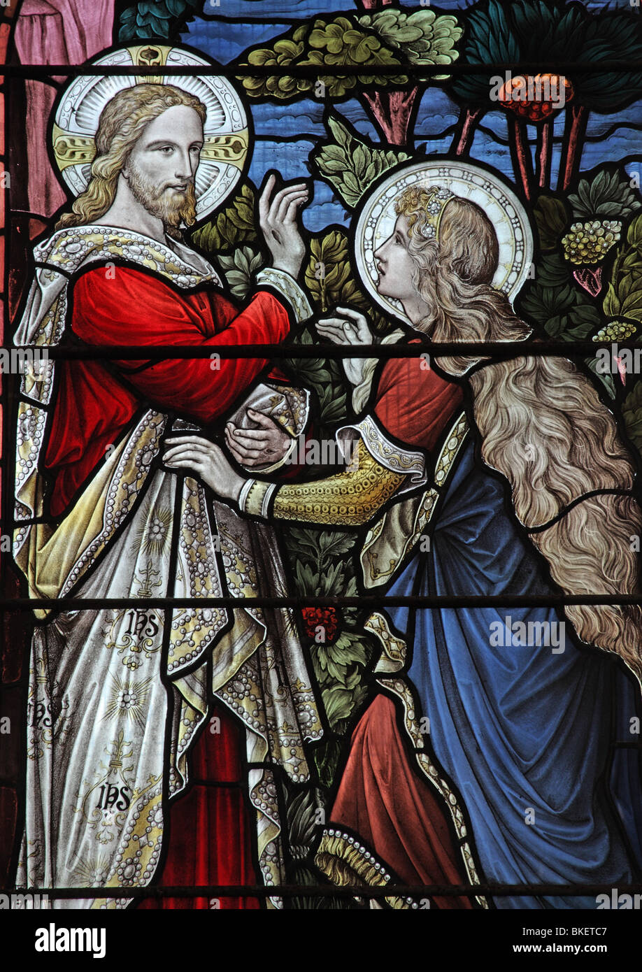 A stained glass window depicting Mary Magdalene meeting the resurrected Jesus at the Sepulchre, Waterfall, Derbyshire, England Stock Photo