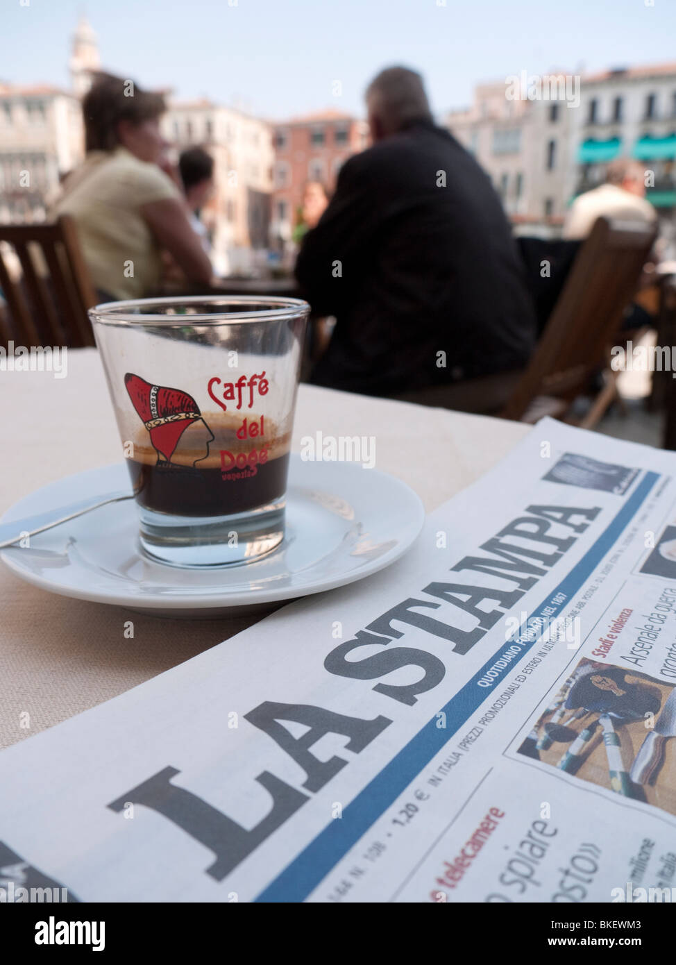 Detail of Italian newspaper and coffee at typical cafe in Venice Italy Stock Photo