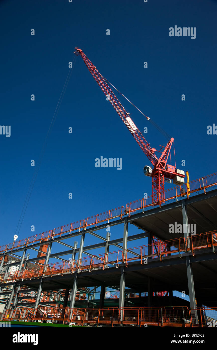 A tower crane working on a redevelopment in Wigan Stock Photo