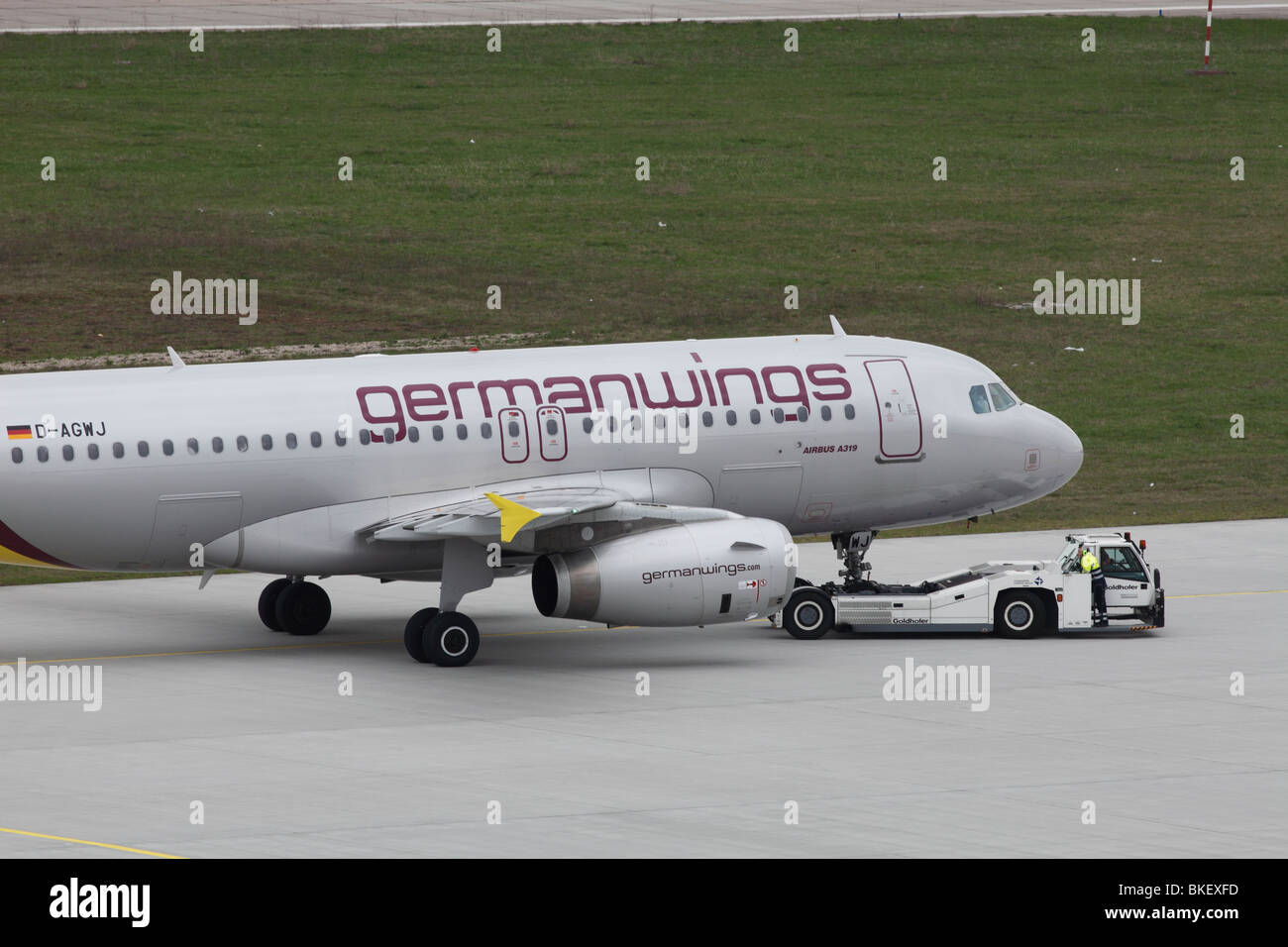 Airbus A319 of Germanwings being towed across airport ramp apron taxiway Stock Photo Alamy