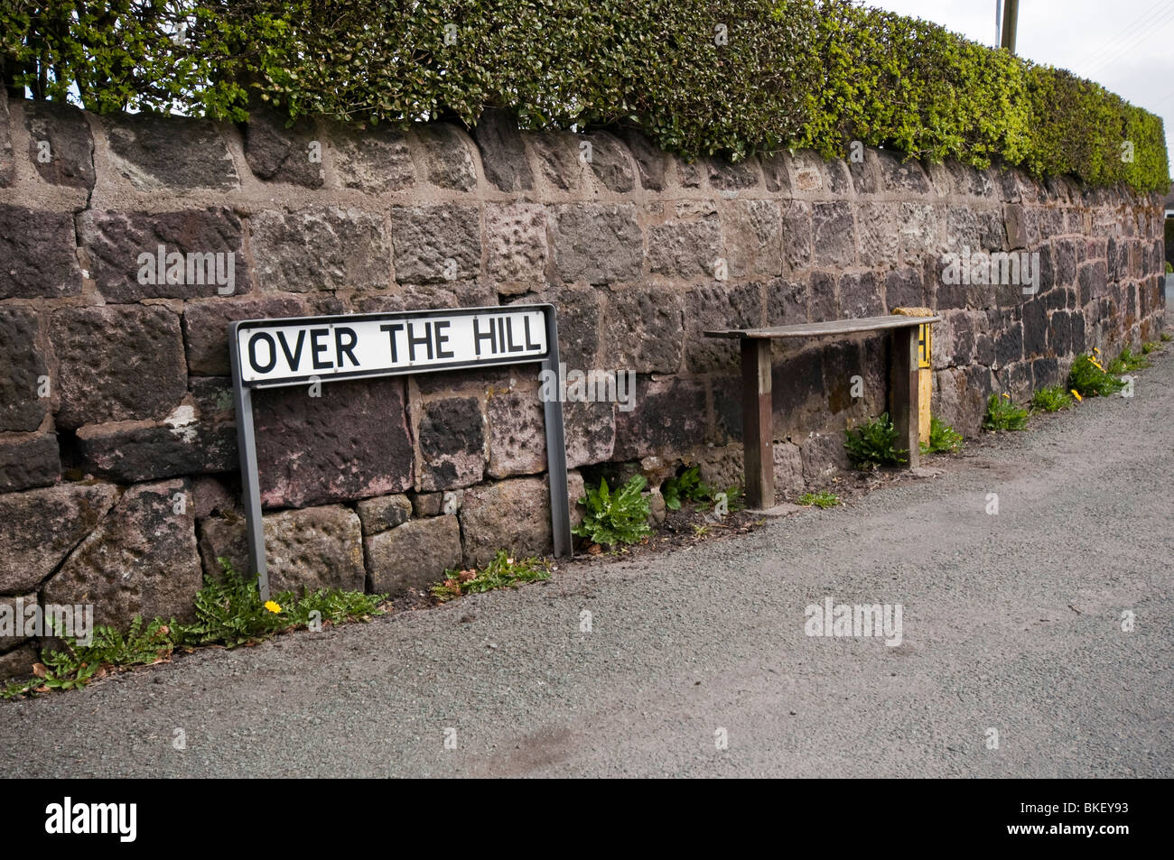 A road sign for 'Over The Hill' at Biddulph Moor, near Stoke-upon-Trent, Staffordshire. Stock Photo