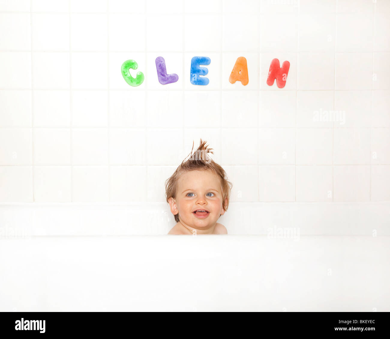 Baby boy in bathtub Stock Photo Alamy