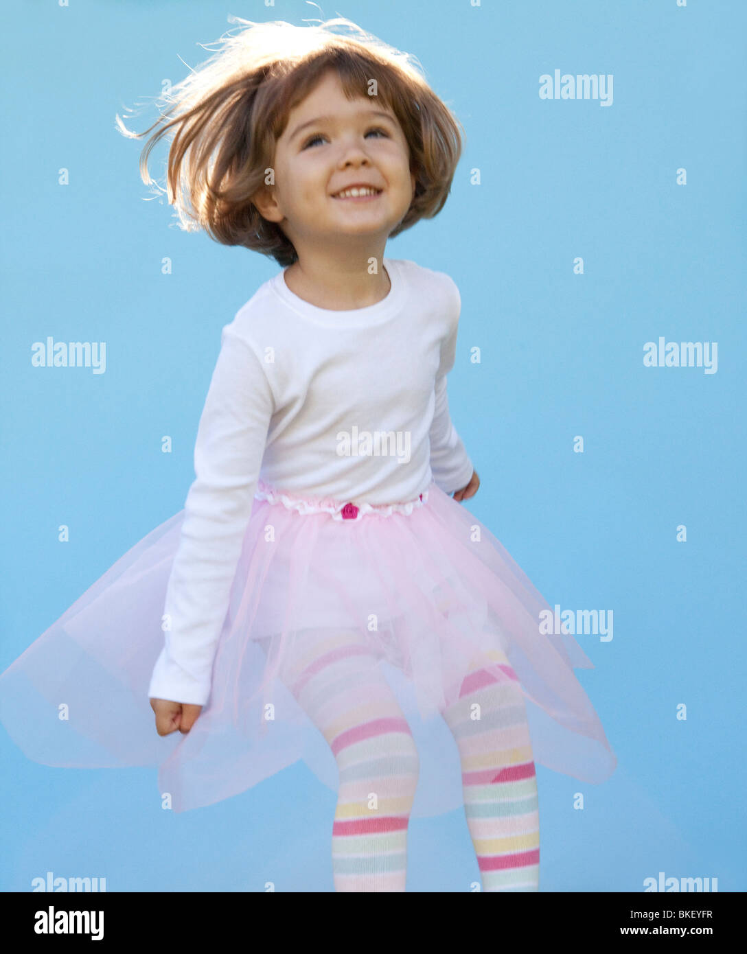 Jumping girl in pink tutu Stock Photo Alamy
