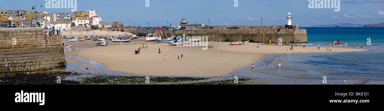 St Ives harbour beach and Smeatons pier panorama at low tide. Stock Photo